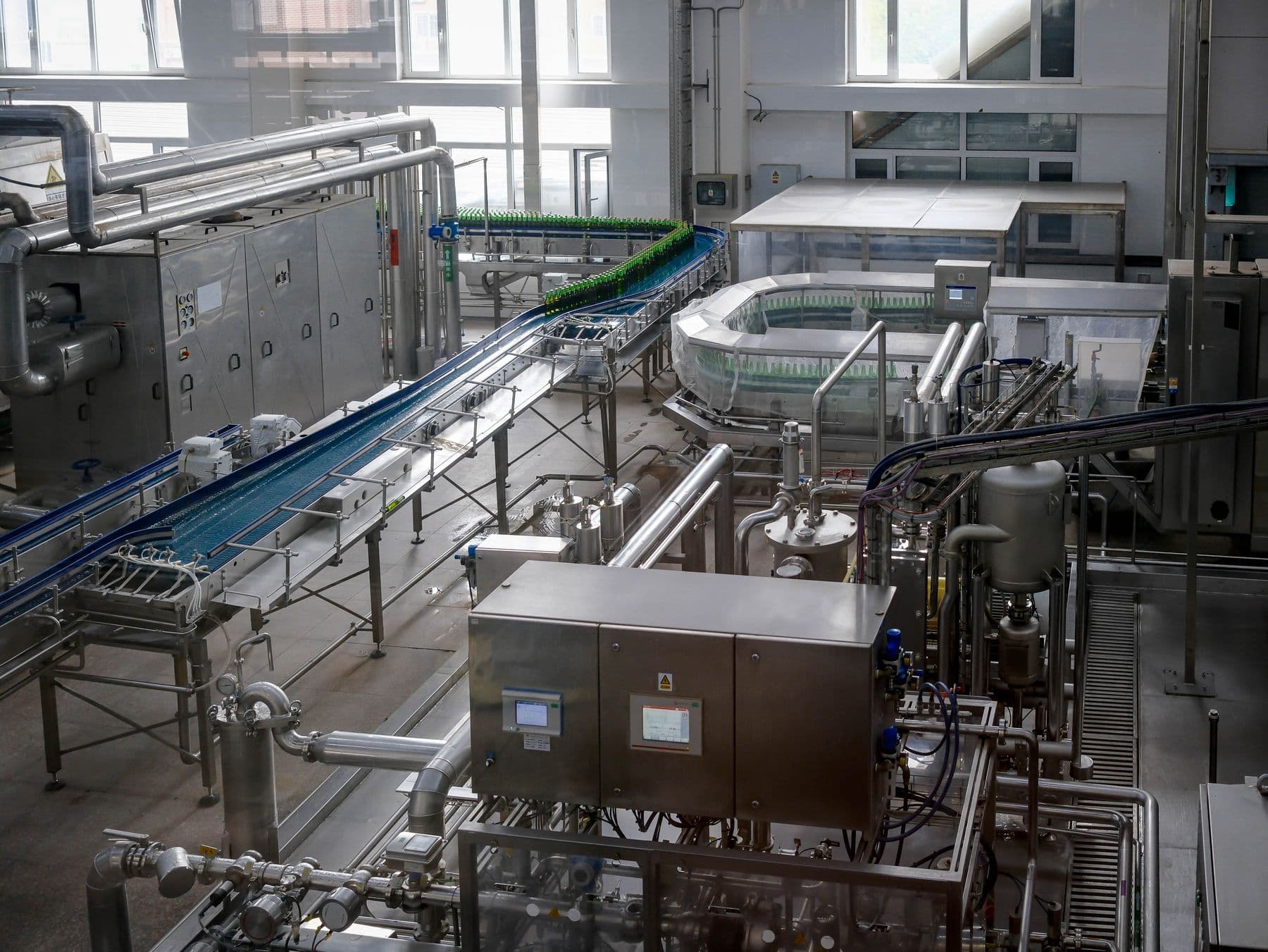Stainless steel food processing hall with conveyors and drying equipment